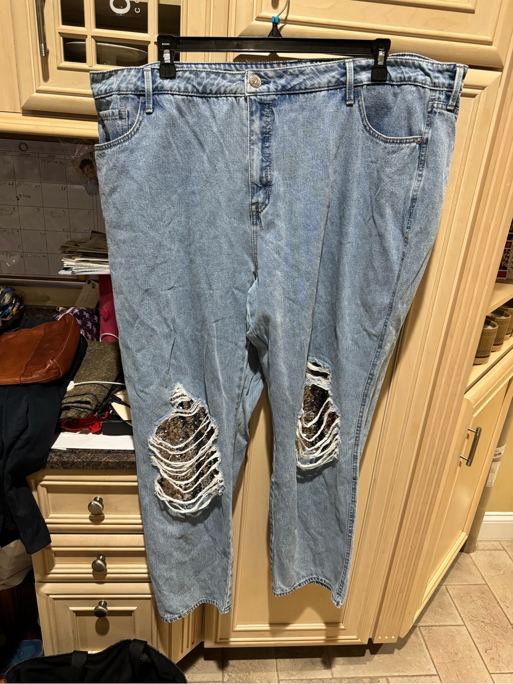 Light Blue Straight Leg Women’s Jeans with Distressed Knee Panels